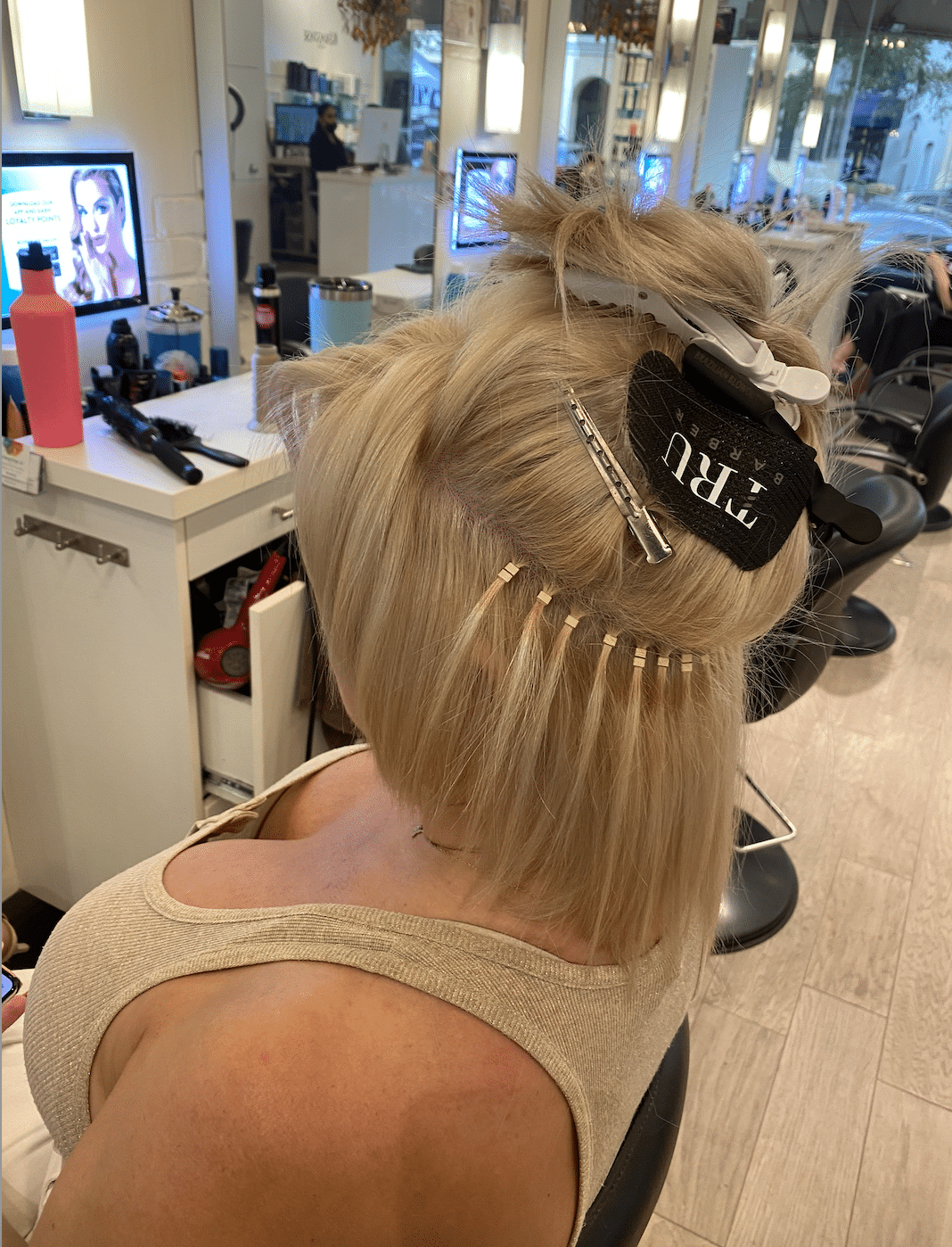 professional hand tied hair extensions installation Winter Park
