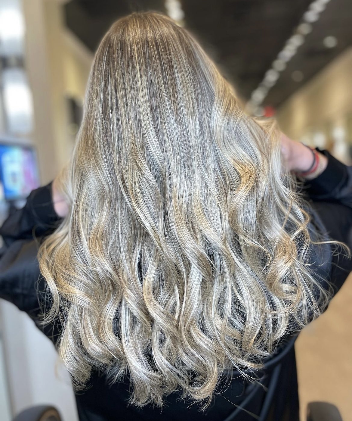 hair extension specialist at Bonne Vie Salon Winter Park FL